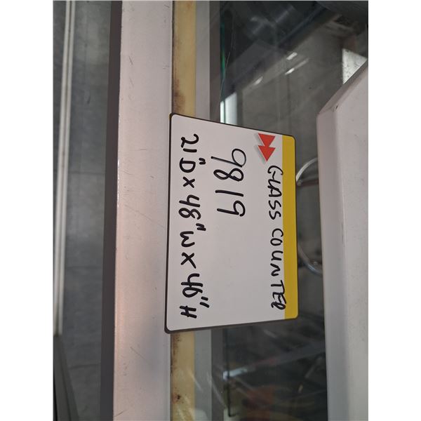 GLASS DISPLAY CABINETS -21"D X 60"W X 40"H. DISPLAY IS LIGHTED. DOES NOT INCLUDE CONTENTS. UNITS ARE