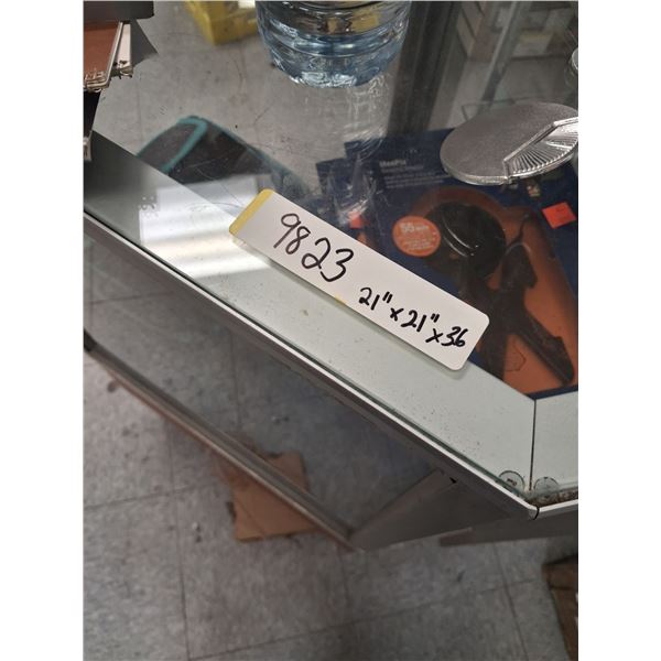 GLASS DISPLAY CABINETS -21"D X 60"W X 40"H. DISPLAY IS LIGHTED. DOES NOT INCLUDE CONTENTS. UNITS ARE