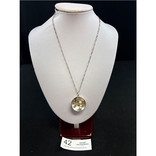 A Sterling Silver Necklace With Sterling Gold Pan Pendant Weighs 13.6 Grams