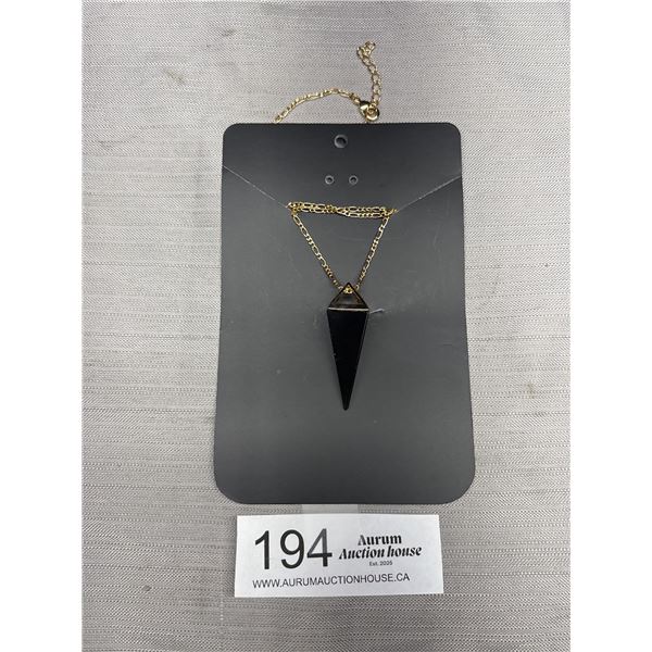 A New Black Gemstone Pyramid Pendant on Gold Tone Necklace