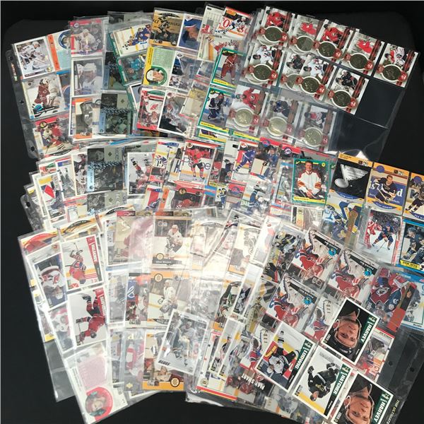 LOT OF HOCKEY TRADING CARDS IN BINDER SLEEVES