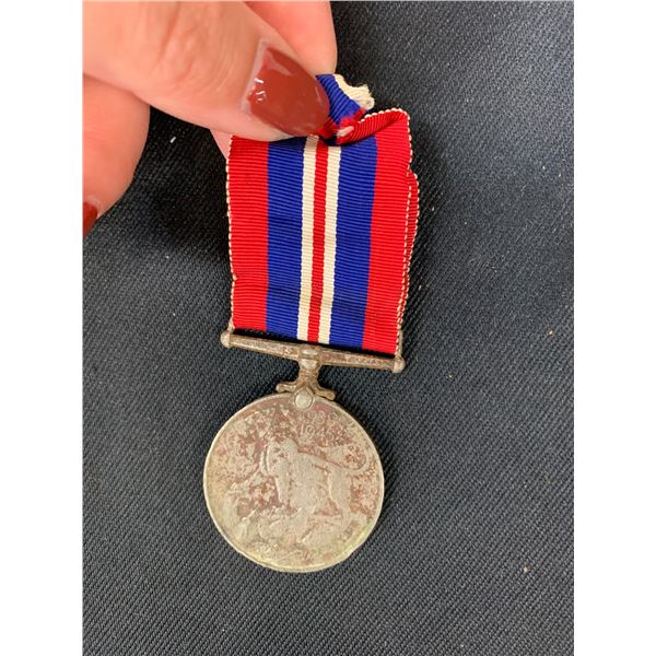 1945 WW2 King George Medal (heavily worn)