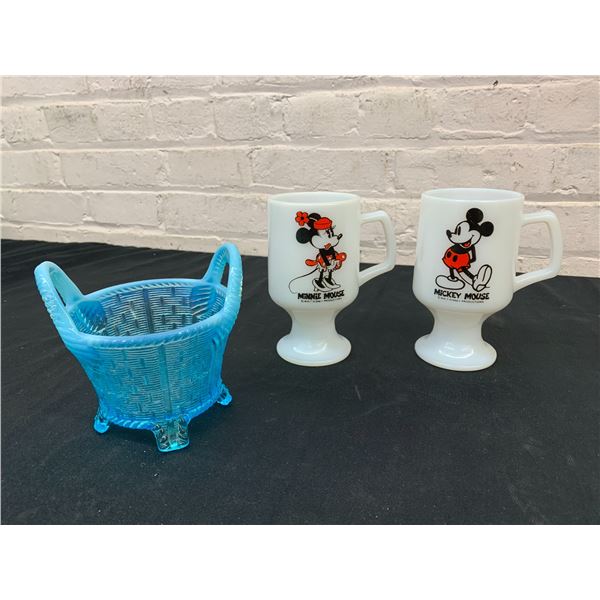 Pair of Milk Glass Mickey and Minnie Mouse Mugs and Blue Glass Woven Basket Decoration