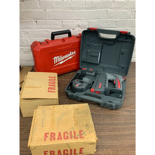 Arrow CT50 Staple Gun with Charger & Battery in Case, Empty Tool Case and 2 Boxes of Staples