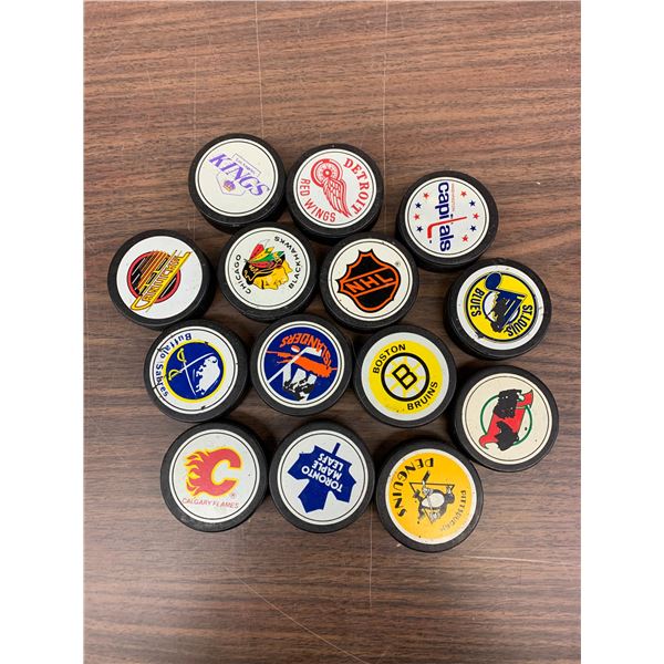 Lot of 14 Hockey Pucks