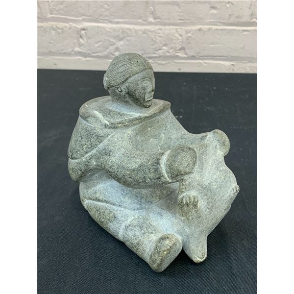 Inuit Carved Stone Figurine, Artist Signed Woman Holding Seal