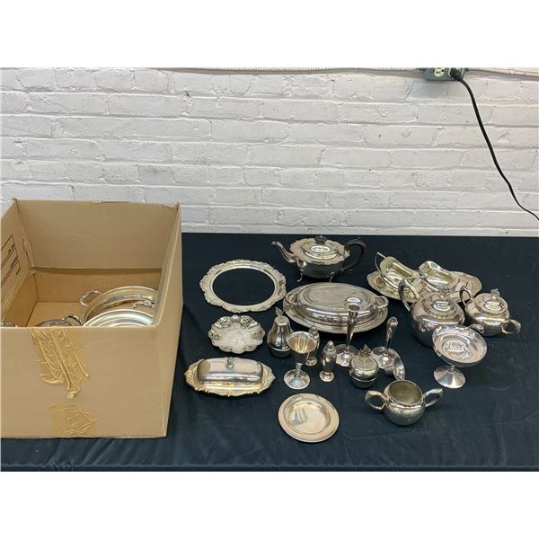 Large Lot of Silverplate Serviceware Candlesticks, Serving Trays, Tea Pots, Cream, Sugar, etc