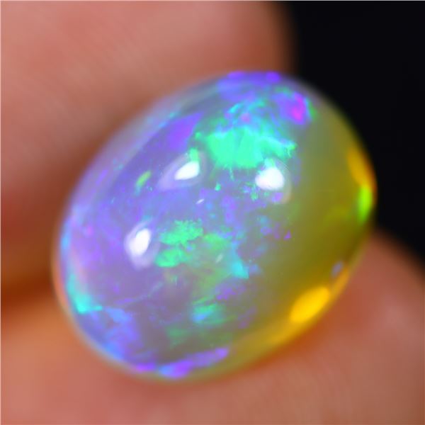 5.44 ct Certified Bright Flash Opal gemstone ($2,720 Appraisal)