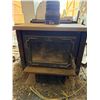 Image 1 : Ostrum Wood Stove with Glass Door and Chimney Pipe