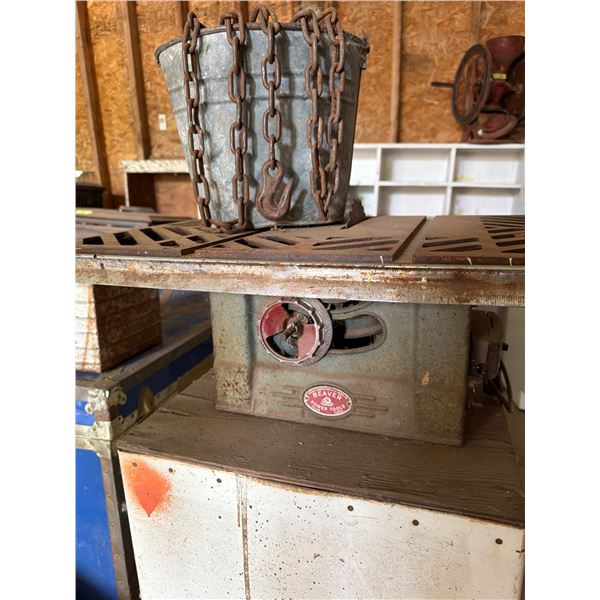 Beaver Table Saw with Bucket of Chains