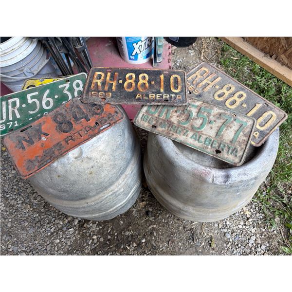 Vintage License Plates with Two Antique Beer Kegs