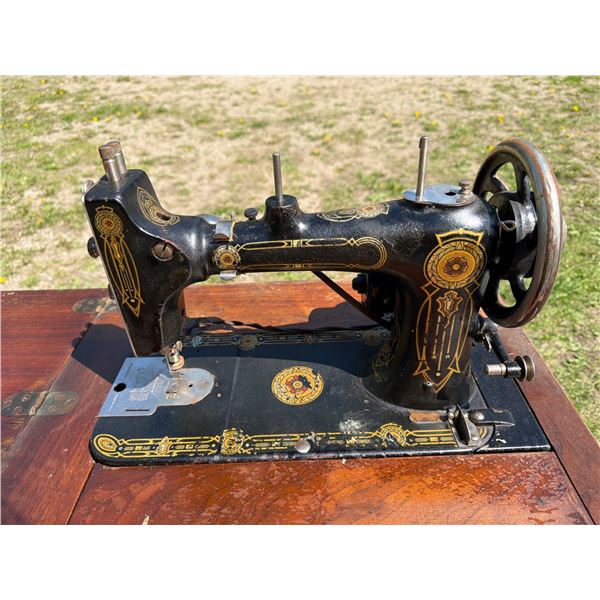 Vintage Sewing Machine with Wooden Cabinet