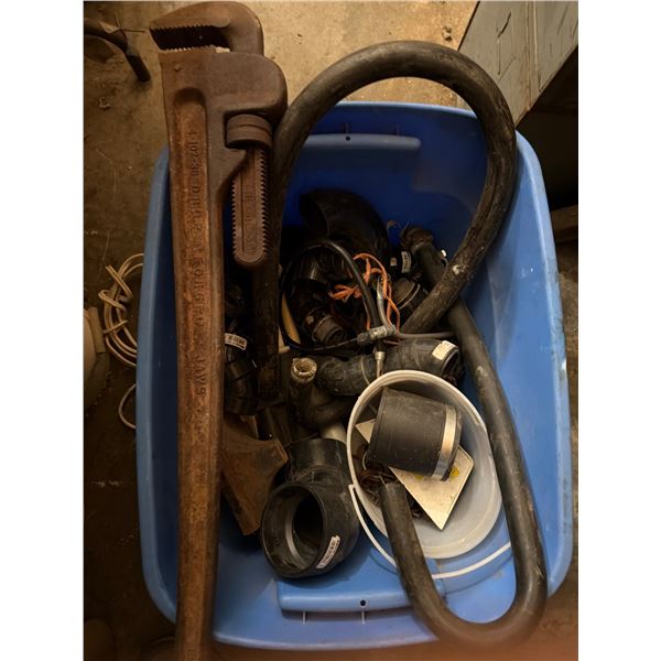 Plumbing Supplies with Large Pipe Wrench