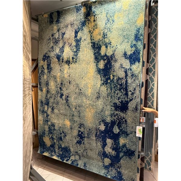 New - Ivory/Blue Area Rug - approx. 78in x 114in - MSRP $2,280 - new floor model