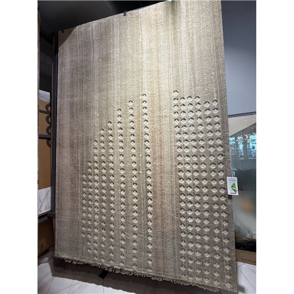 New - Beige Patterned Area Rug - approx. 116in x 78in - MSRP $2,360 - new floor model