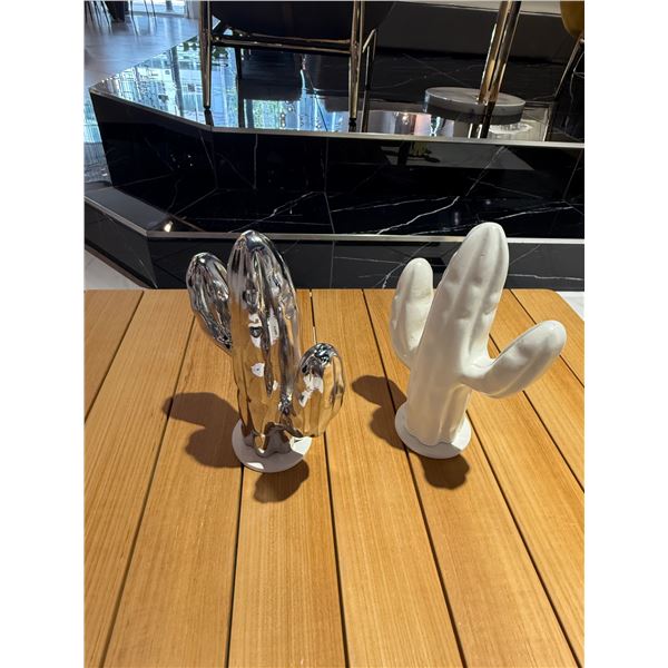 Cactus in Small, one white and one chrome retail $425 each 8''x4''x11''H made in Italy by Fuoriluogo