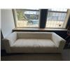 Image 1 : Modern Low Profile Cream Sofa, H25" x W89" x D36" - slightly dusty...