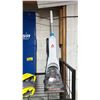Image 3 : SHELF OF ASSORTED ITEMS INCLUDING; PROGRESSION FITNESS YOGA MAT, BISSELL READYCLEAN CARPET CLEANER