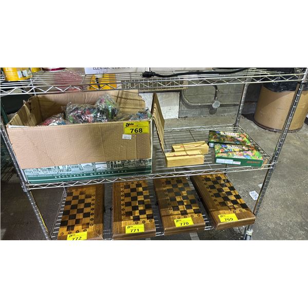 SHELF OF ASSORTED ITEMS INCLUDING; SNAKES & LADDERS, DOMINOS & MOUTH TIPS