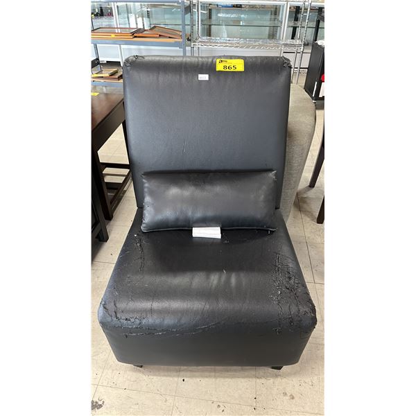 BLACK FAUX LEATHER ARMLESS CHAIR WITH LUMBAR PILLOW: *UPHOLSTERY IS CRACKING IN SEVERAL AREAS*