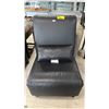 Image 1 : BLACK FAUX LEATHER ARMLESS CHAIR WITH LUMBAR PILLOW: *UPHOLSTERY IS CRACKING IN SEVERAL AREAS*