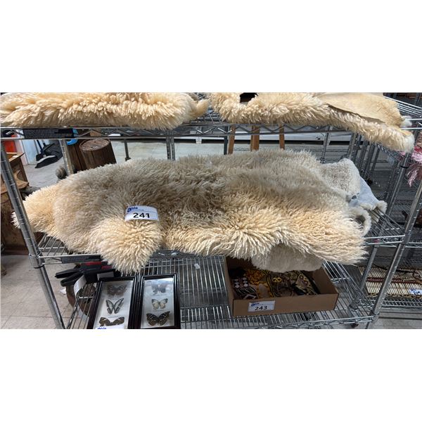 (3) SMALL SHEEPSKIN RUGS