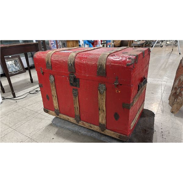 ANTIQUE RED STEAMER TRUNK FILLED WITH ASSORTED HAND TOOLS