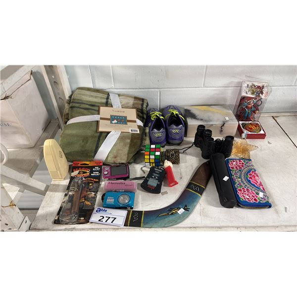NIKON DIGITAL CAMERA, OLYMPUS DIGITAL CAMERA, BOOMERANG, RUBIX CUBE, THROW BLANKET, SOCCER KLEATS,