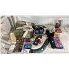 Image 1 : NIKON DIGITAL CAMERA, OLYMPUS DIGITAL CAMERA, BOOMERANG, RUBIX CUBE, THROW BLANKET, SOCCER KLEATS,