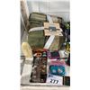 Image 2 : NIKON DIGITAL CAMERA, OLYMPUS DIGITAL CAMERA, BOOMERANG, RUBIX CUBE, THROW BLANKET, SOCCER KLEATS,