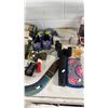 Image 3 : NIKON DIGITAL CAMERA, OLYMPUS DIGITAL CAMERA, BOOMERANG, RUBIX CUBE, THROW BLANKET, SOCCER KLEATS,