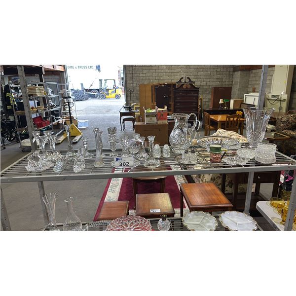 SHELF OF ASSORTED GLASS CANDLE HOLDERS, VASES, PITCHER, SALT & PEPPER SHAKERS & MORE