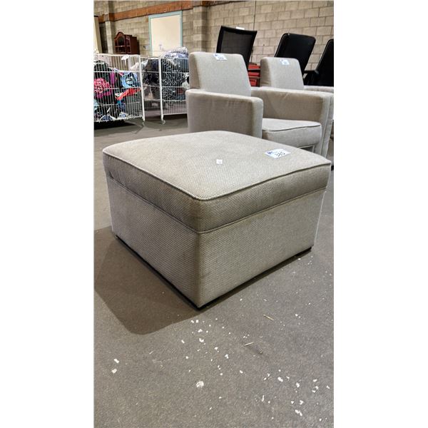 GREY UPHOLSTERED OTTOMAN *NEEDS CLEANING*