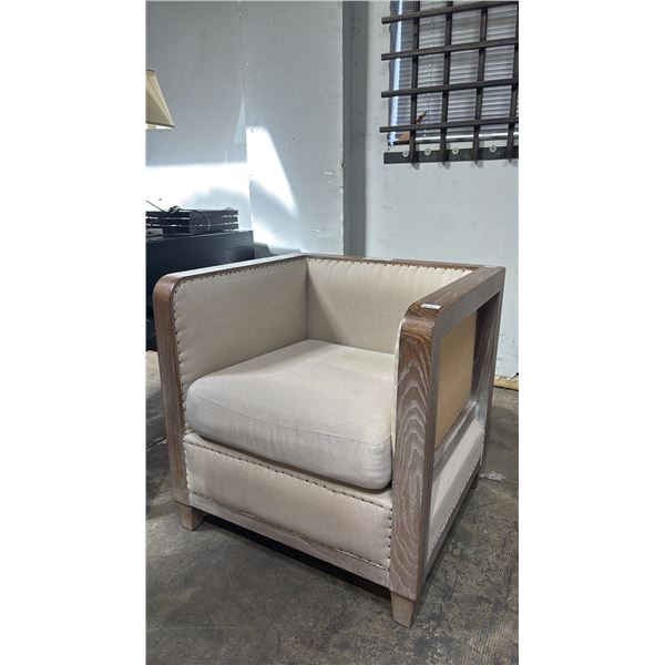 WOOD FRAMED ARM CHAIR WITH NAIL HEAD DETAIL