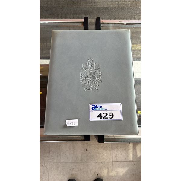 GREY FOLDER WITH ASSORTED CANADIAN STAMPS