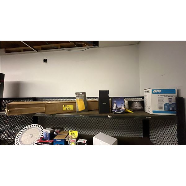 SHELF OF ASSORTED ITEMS INCLUDING 3-IN-1 UNIVERSAL PHONE HOLDERS AND GARAGE LIGHT , FUEL FILTER AND