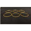 Image 1 : SIX APPROX 22K BANGLES SET WITH RED & GREEN STONES (78.8G)
