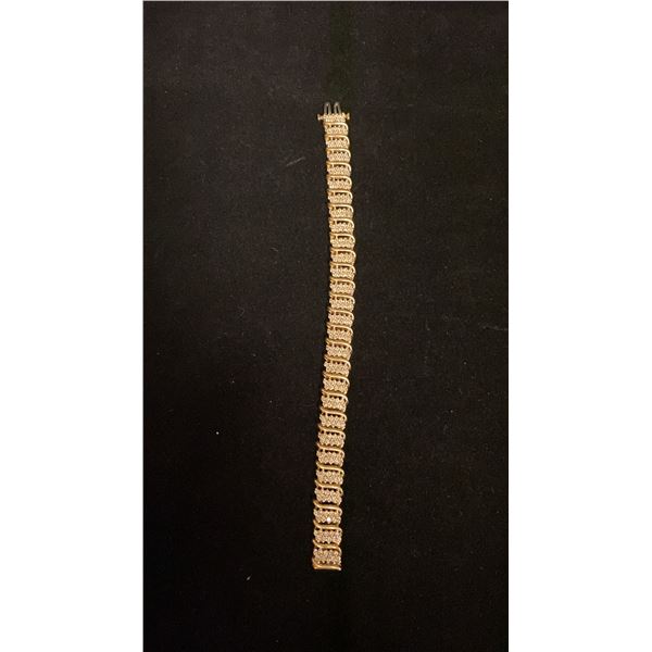 APPROX 10 BRACELET (7") SET WITH DIAMONDS (.015CT) (19.7G)