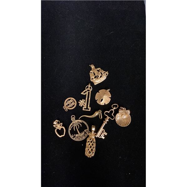 TEN APPROX 10K+ CHARMS (14.6G)