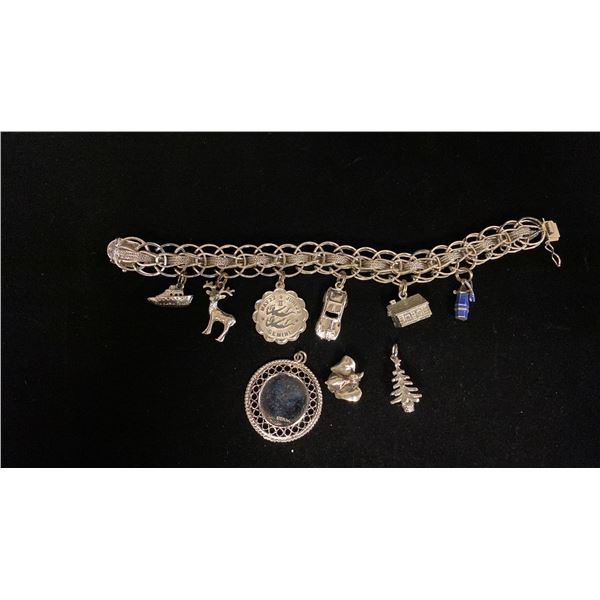 THREE SILVER CHARMS & SILVER CHARM BRACELET WITH SILVER & METAL CHARMS (44.1G)