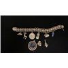 Image 1 : THREE SILVER CHARMS & SILVER CHARM BRACELET WITH SILVER & METAL CHARMS (44.1G)