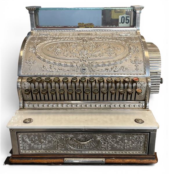 Antique National Cash Register with Ornate Nickle Plated Surface and White Marble Ledge