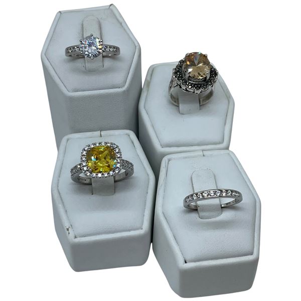 4 Rings Stamped .925 - Like New (CZ, Marcasite, Citrine and Clear Crystals) - Widest ring face is 16