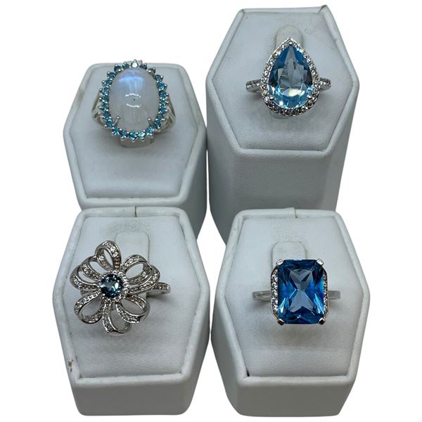 4 Blue Topaz Crystal Ring Stamped .925 - Widest ring face is 20 mm * Total weight: 18 grams