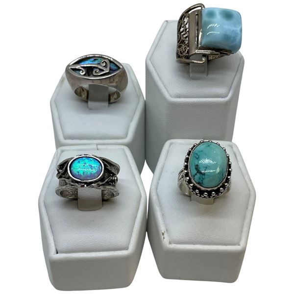 4 Rings Stamped .925 - Variety of Colours & Materials - Widest ring face is 22 mm * Total weight: 28