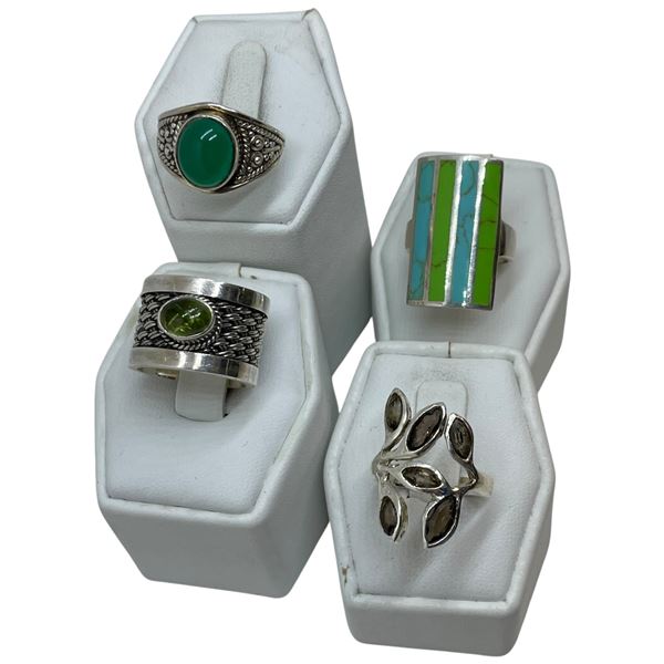 4 Natural Gemstone and Crystal Rings Stamped .925 - Widest ring face is 29 mm * Total weight: 32 gra