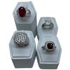 Image 1 : 4 Rings Stamped .925 (CZ, Clear and Garnet Crystal) Widest ring face is 17 mm * Total weight: 25 gra