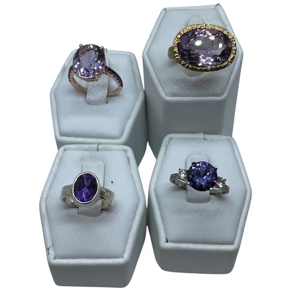 4 Amethyst Crystal Rings Stamped .925 - Widest ring face is 25 mm * Total weight: 22 grams