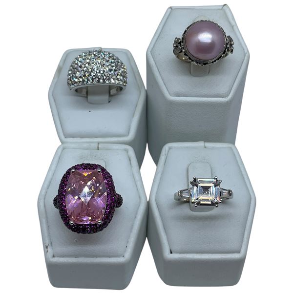 4 Rings Stamped .925 (Pearl, Pink, and Clear Crystals) Widest ring face is 22 mm * Total weight: 30 