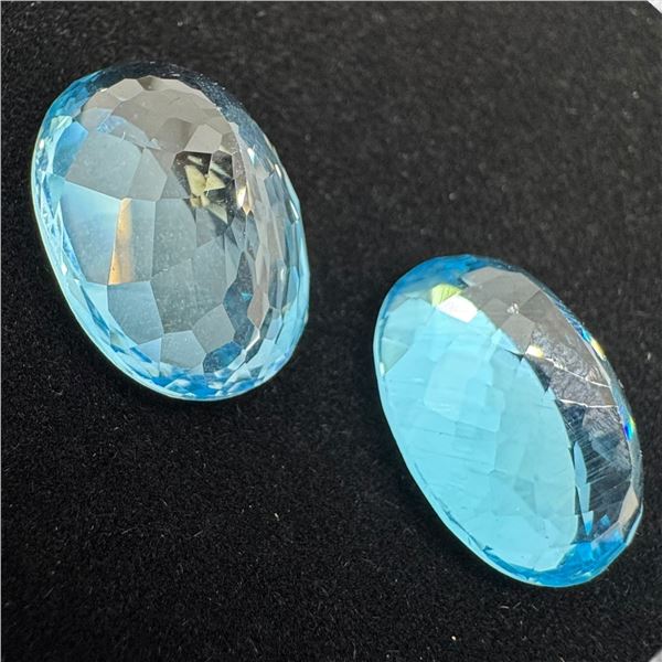 Pair of Natural Royal Blue Topaz Gemstones - 59.35 CTW (Oval Mixed Cut ) * Includes Gemologist Certi
